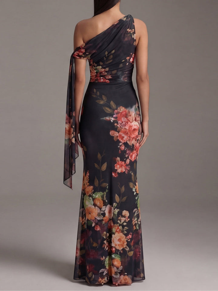 Zwarte geplisseerde maxi-jurk van chiffon met print en één blote schouder