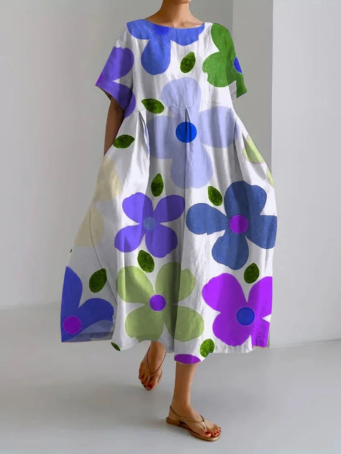 Olga | Zomerjurk met bloemenprint en tailleceintuur