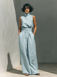 Dames minimalistische set met mouwloze blouse en wijde broek